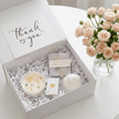 Cozy spa gift set with candles skincare and self care products