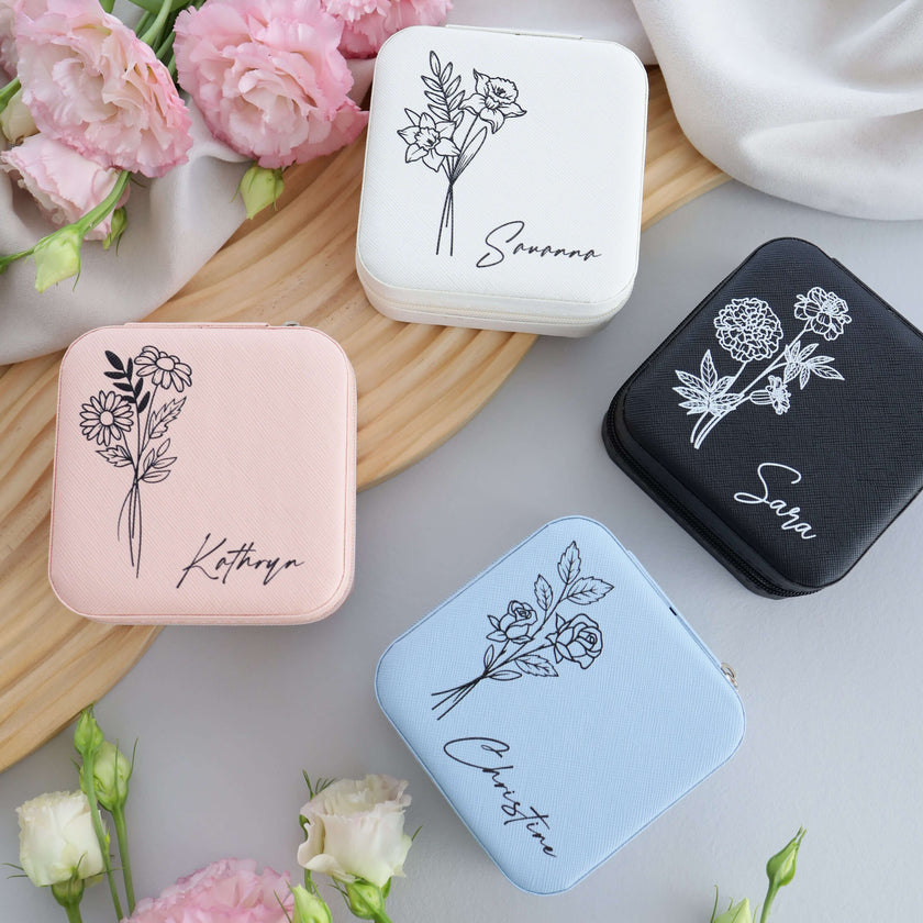 Birth flower jewelry boxes in multiple colors flat lay set