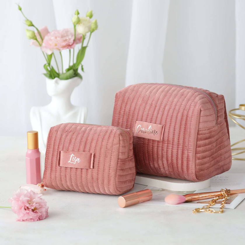 Set of personalized velvet makeup bags in soft pink colors cosmetic pouches