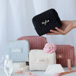 Makeup bag held in hands personalized velvet cosmetic pouch
