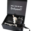 Open bridesmaid gift box with tumbler and jewelry box inside