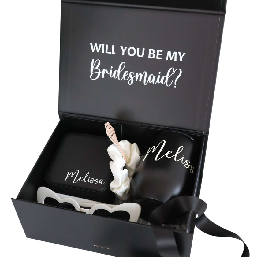 Open bridesmaid gift box with tumbler and jewelry box inside