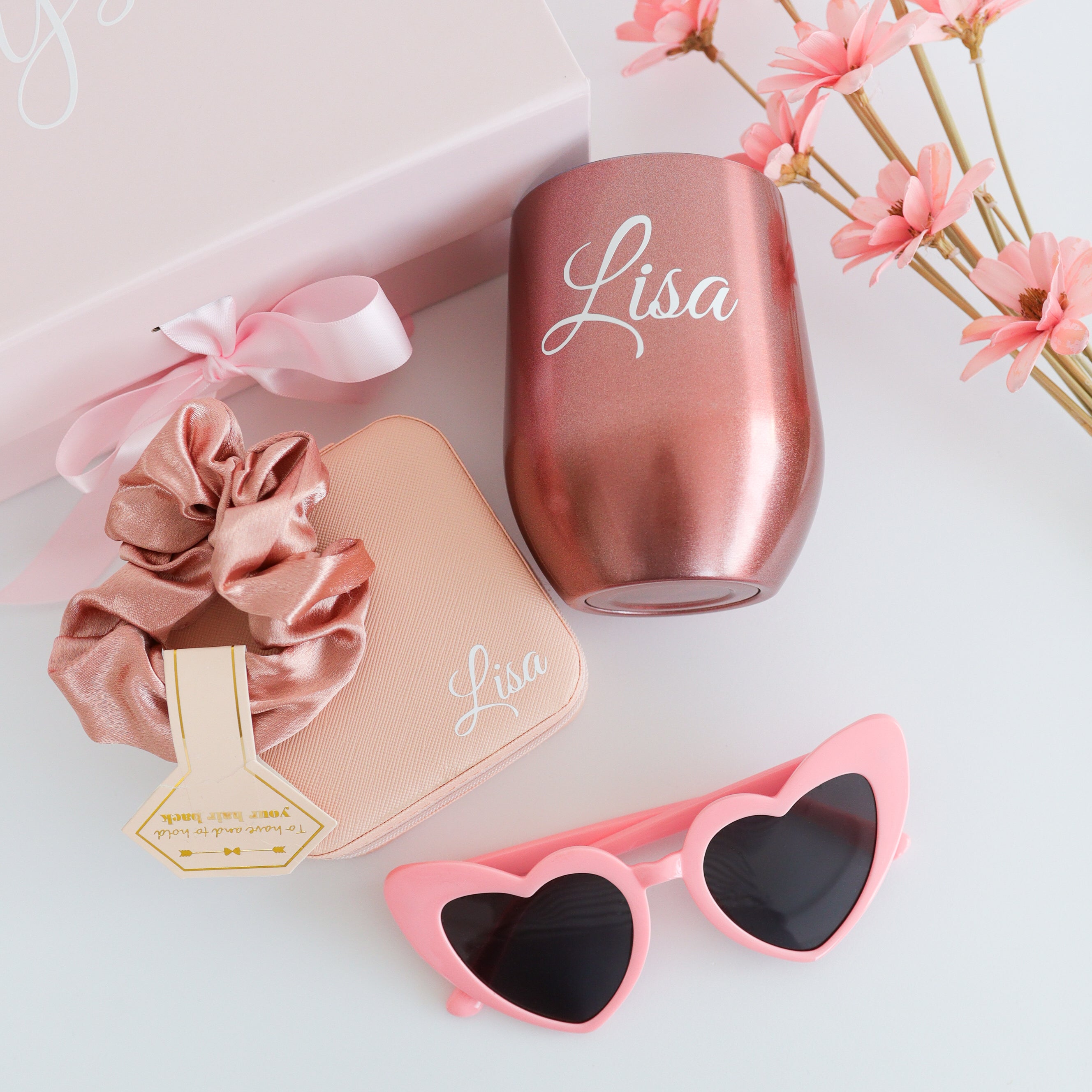Pink bridesmaid tumbler and accessories aesthetic setup
