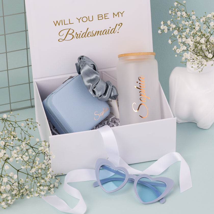 Bridesmaid gift boxes in pastel colors with tumbler sets
