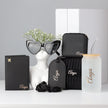 Bridesmaid gift box set displayed with flowers and decor