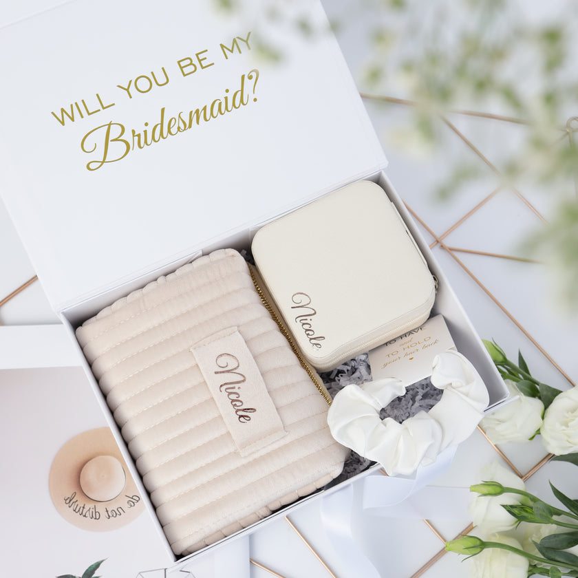 Bridesmaid proposal gift box with accessories arranged aesthetic