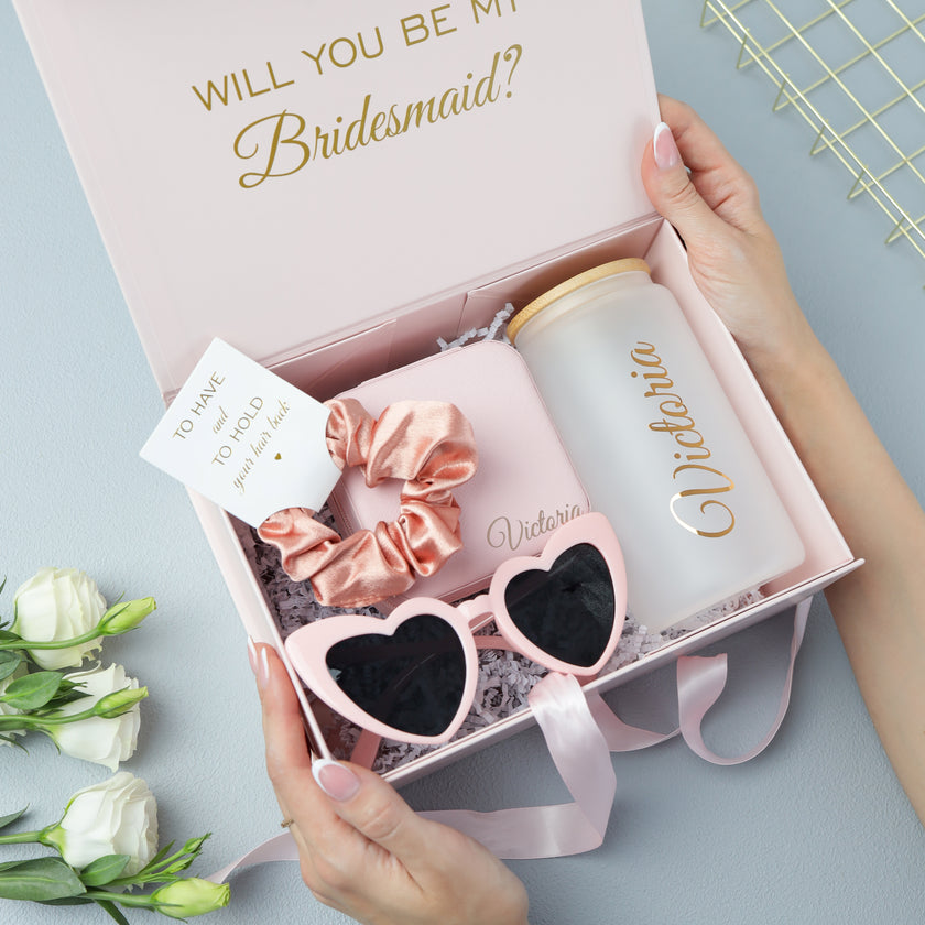 Bridesmaid gift box with tumbler held in hands lifestyle photo