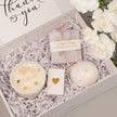 Cozy hygge gift box with candle skincare and bath essentials