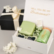 Bridesmaid gift box with tumbler and cosmetic items aesthetic