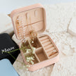Open jewelry box with rings and compartments travel organizer